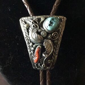 Bolo tie, Rare piece to find sterling silver Navajo bolo with turquoise and red